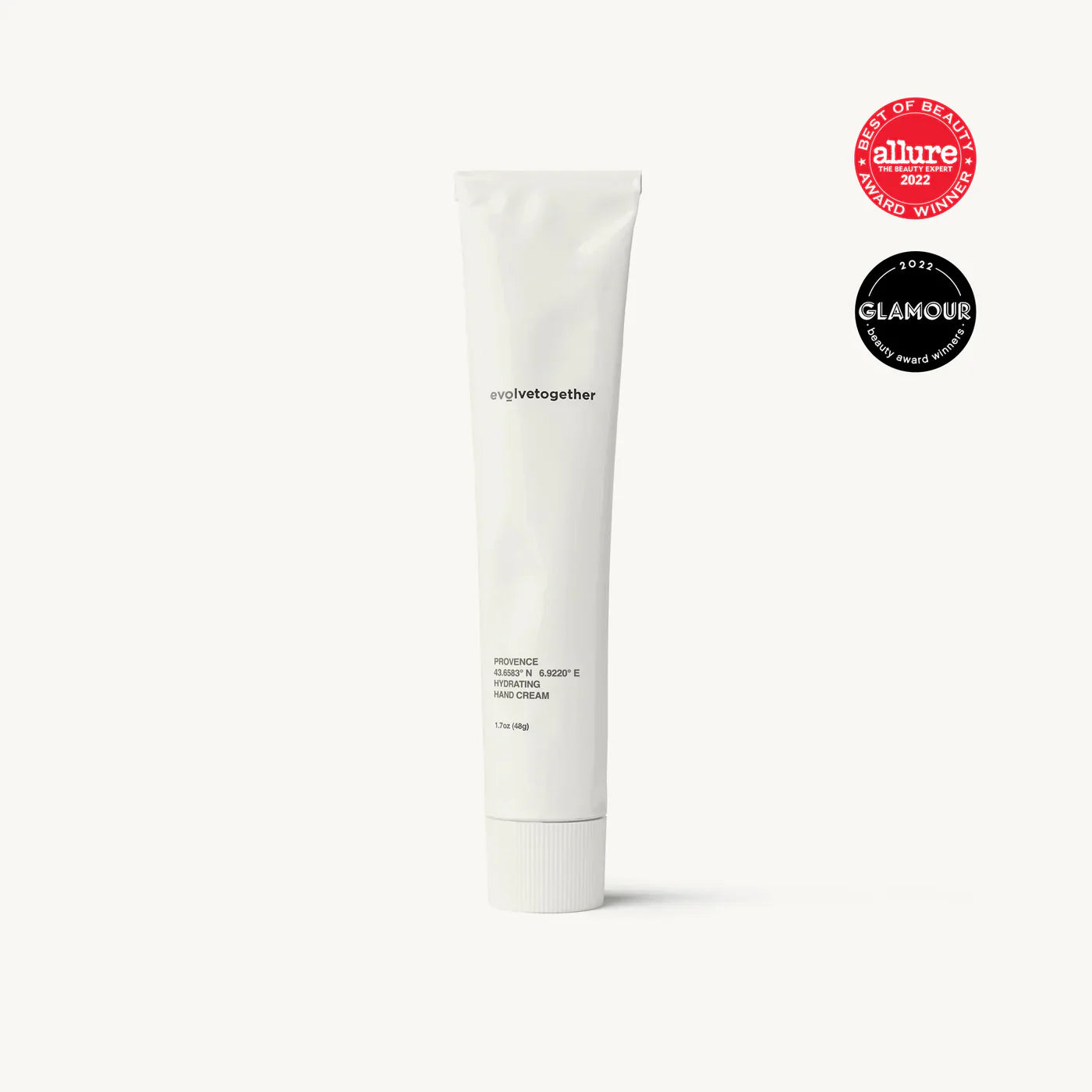 A tube of beauty cream with award badges from allure and glamour for the year 2021 displayed in the upper right corner.